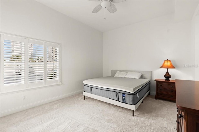 2 Oceans W Blvd Unit 206, Daytona Beach Shores, FL 32118 - carpeted bedroom featuring baseboards and ceiling fan