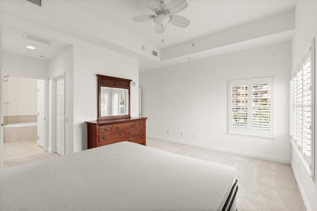 2 Oceans W Blvd Unit 206, Daytona Beach Shores, FL 32118 - bedroom featuring multiple windows, light carpet, connected bathroom, recessed lighting, and ceiling fan