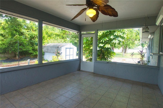 2548 Crestwood Ave, New Smyrna Beach, FL 32168 - unfurnished sunroom featuring ceiling fan
