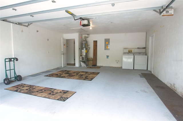 2548 Crestwood Ave, New Smyrna Beach, FL 32168 - garage featuring washing machine and dryer, electric panel, a garage door opener, and water heater