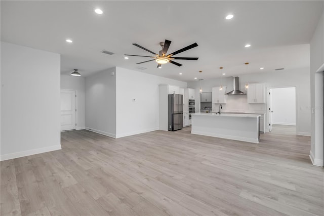 2324 Orange Tree Dr, Edgewater, FL 32141 - unfurnished living room featuring recessed lighting, a ceiling fan, and light wood finished floors