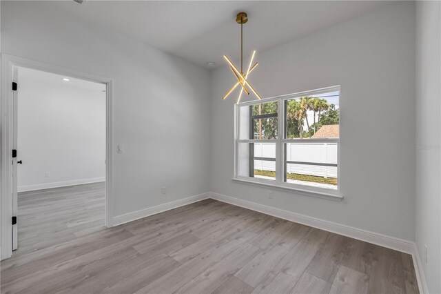 2324 Orange Tree Dr, Edgewater, FL 32141 - spare room with wood finished floors and baseboards