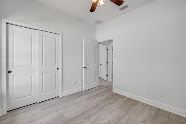 2324 Orange Tree Dr, Edgewater, FL 32141 - unfurnished bedroom featuring light wood finished floors, a closet, and a ceiling fan