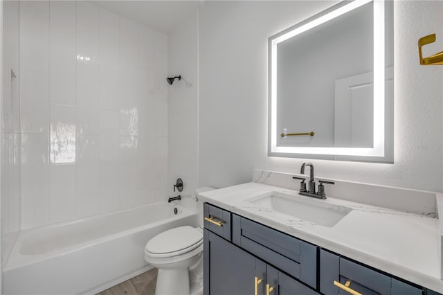 2324 Orange Tree Dr, Edgewater, FL 32141 - full bath featuring vanity,  shower combination, and wood finished floors