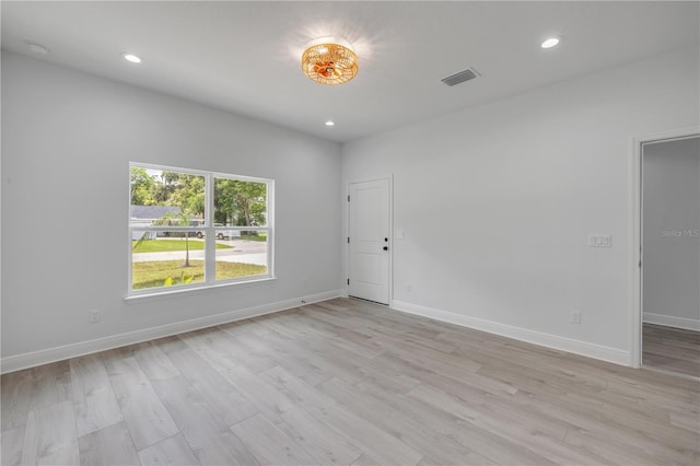 2324 Orange Tree Dr, Edgewater, FL 32141 - unfurnished room featuring light wood finished floors and recessed lighting