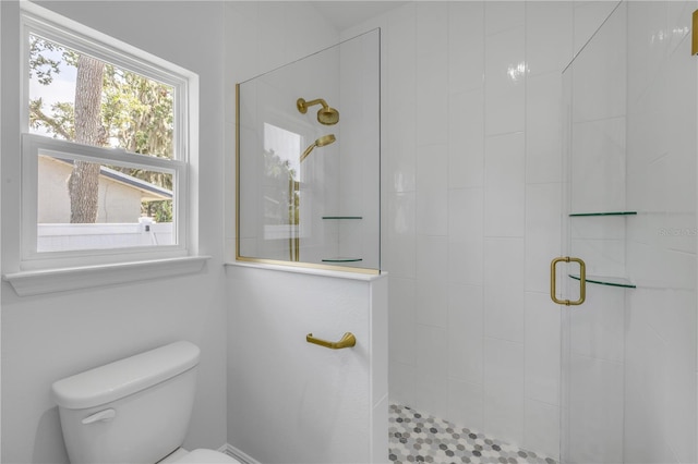 2324 Orange Tree Dr, Edgewater, FL 32141 - full bathroom featuring a shower stall and toilet