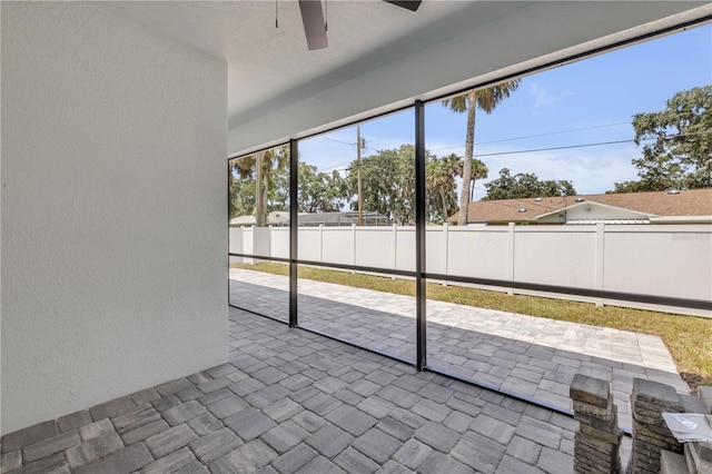 2324 Orange Tree Dr, Edgewater, FL 32141 - unfurnished sunroom featuring a ceiling fan