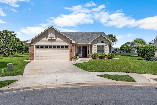 684 Rochester Ct, New Smyrna Beach, FL 32168 - single story home featuring a front yard, concrete driveway, an attached garage, and brick siding
