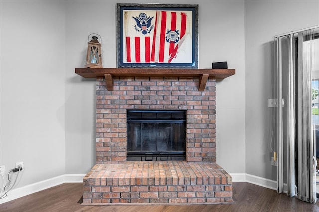 684 Rochester Ct, New Smyrna Beach, FL 32168 - detailed view of wood finished floors and a fireplace