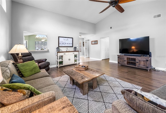 684 Rochester Ct, New Smyrna Beach, FL 32168 - living room with high vaulted ceiling, ceiling fan, and wood finished floors