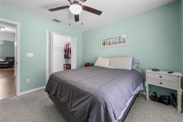 684 Rochester Ct, New Smyrna Beach, FL 32168 - bedroom featuring carpet flooring, ceiling fan, a closet, and a spacious closet