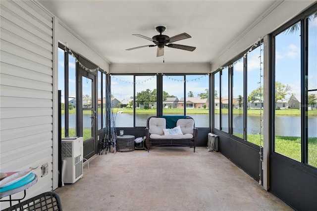 684 Rochester Ct, New Smyrna Beach, FL 32168 - sunroom featuring a ceiling fan, a water view, and healthy amount of natural light
