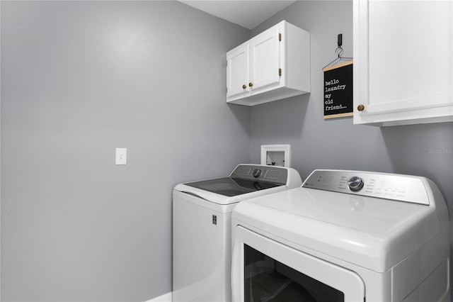 684 Rochester Ct, New Smyrna Beach, FL 32168 - washroom featuring cabinet space and separate washer and dryer