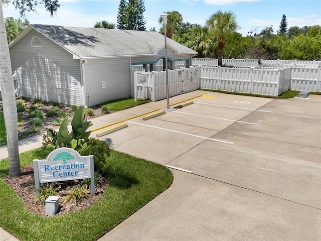 684 Rochester Ct, New Smyrna Beach, FL 32168 - view of community featuring uncovered parking