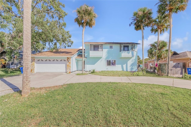 2715 Pine Tree Dr, Edgewater, FL 32141 - view of front of house with concrete driveway, an attached garage, and a balcony