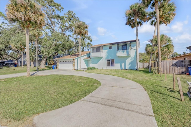 2715 Pine Tree Dr, Edgewater, FL 32141 - view of front of property featuring concrete driveway and a garage