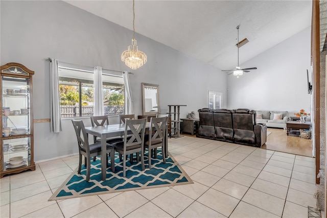 2715 Pine Tree Dr, Edgewater, FL 32141 - dining space with high vaulted ceiling, light tile patterned flooring, healthy amount of natural light, a chandelier, and ceiling fan