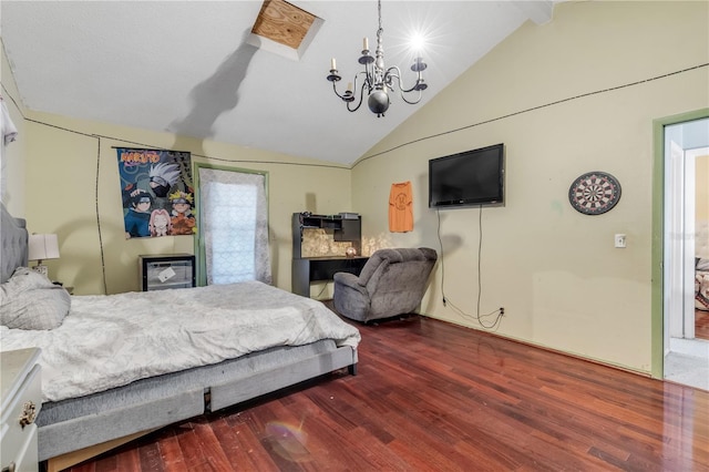 2715 Pine Tree Dr, Edgewater, FL 32141 - bedroom featuring a chandelier, wood finished floors, and high vaulted ceiling