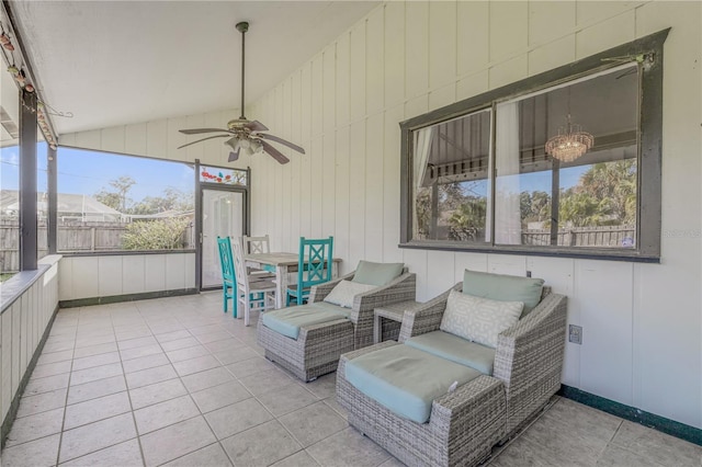 2715 Pine Tree Dr, Edgewater, FL 32141 - sunroom with healthy amount of natural light, ceiling fan, and lofted ceiling