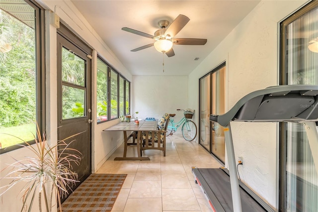 1237 Charter Oaks Cir, Daytona Beach, FL 32117 - sunroom / solarium with a ceiling fan and tile patterned flooring