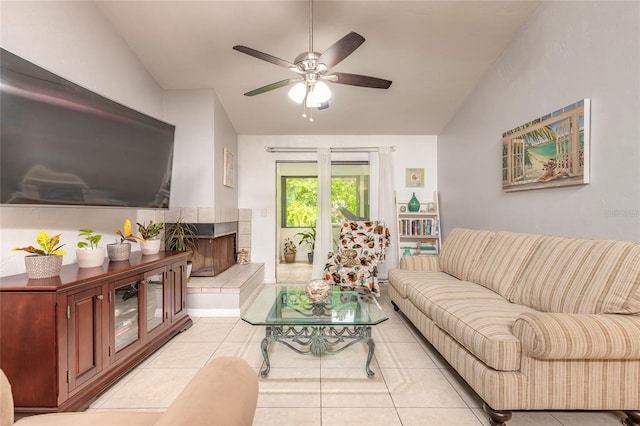 1237 Charter Oaks Cir, Daytona Beach, FL 32117 - living area with vaulted ceiling, a ceiling fan, light tile patterned flooring, and a fireplace