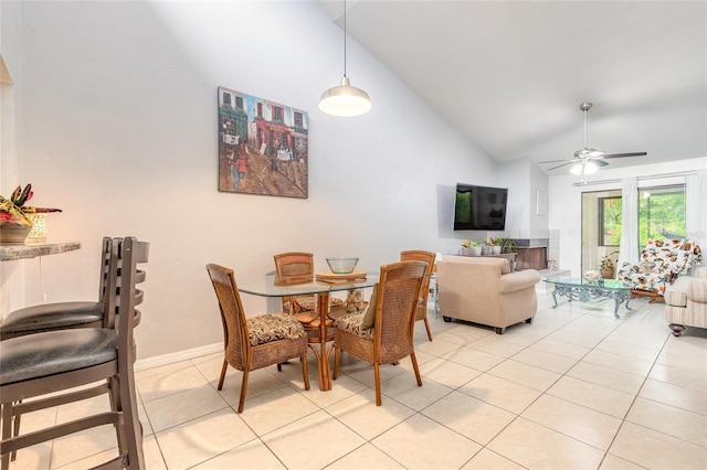 1237 Charter Oaks Cir, Daytona Beach, FL 32117 - dining space featuring high vaulted ceiling, light tile patterned floors, and a ceiling fan