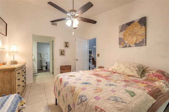 1237 Charter Oaks Cir, Daytona Beach, FL 32117 - bedroom with light tile patterned floors, a high ceiling, ensuite bath, and a ceiling fan