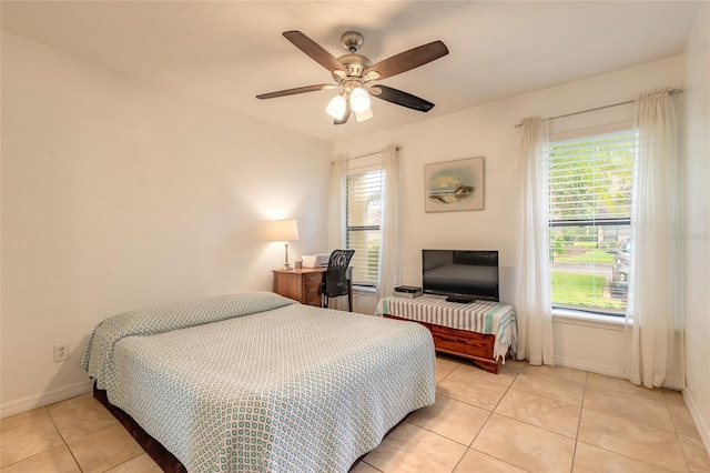 1237 Charter Oaks Cir, Daytona Beach, FL 32117 - bedroom featuring light tile patterned floors and ceiling fan
