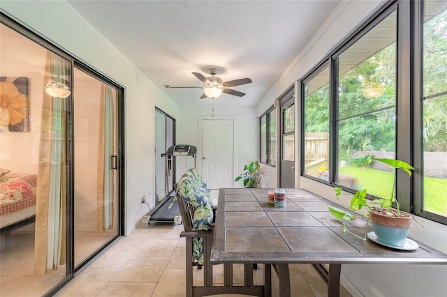 1237 Charter Oaks Cir, Daytona Beach, FL 32117 - sunroom / solarium featuring a ceiling fan, outdoor dining area, and healthy amount of natural light