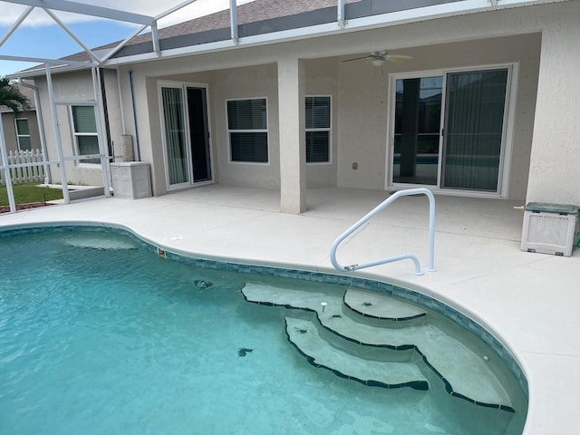 405 Central Mariners Dr, Edgewater, FL 32141 - swimming pool with ceiling fan, a patio area, and a lanai