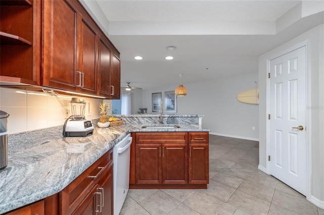 5300 S Atlantic Ave Unit 5-502, New Smyrna Beach, FL 32169 - kitchen with white dishwasher, recessed lighting, a peninsula, light stone counters, and open shelves