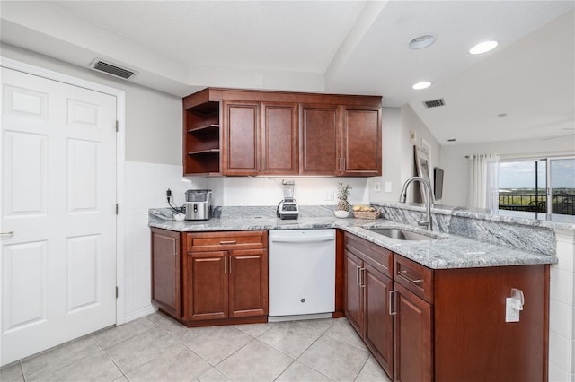 5300 S Atlantic Ave Unit 5-502, New Smyrna Beach, FL 32169 - kitchen featuring white dishwasher, a peninsula, open shelves, light stone counters, and light tile patterned floors