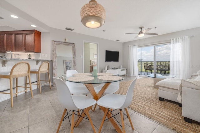 5300 S Atlantic Ave Unit 5-502, New Smyrna Beach, FL 32169 - dining space with light tile patterned flooring, ceiling fan, and recessed lighting