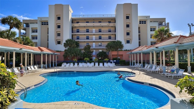 5300 S Atlantic Ave Unit 5-502, New Smyrna Beach, FL 32169 - community pool featuring a patio