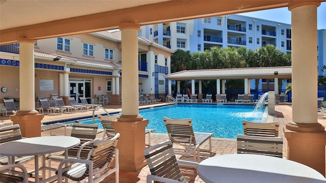 5300 S Atlantic Ave Unit 5-502, New Smyrna Beach, FL 32169 - community pool featuring a patio area