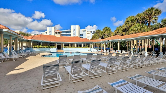 5300 S Atlantic Ave Unit 5-502, New Smyrna Beach, FL 32169 - community pool featuring a patio