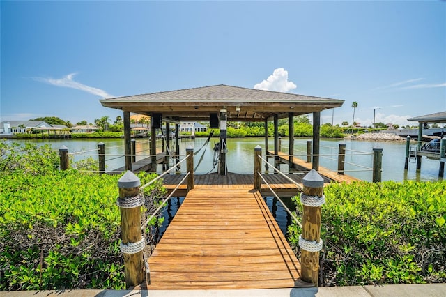 1212 S Riverside Dr, New Smyrna Beach, FL 32168 - dock with boat lift and a water view