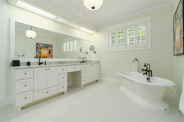 1212 S Riverside Dr, New Smyrna Beach, FL 32168 - bathroom with double vanity, crown molding, a freestanding tub, and plenty of natural light