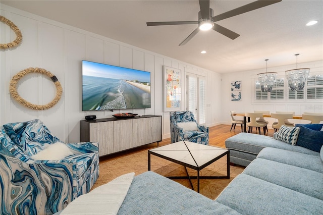 1212 S Riverside Dr, New Smyrna Beach, FL 32168 - living room featuring light wood-style flooring, a decorative wall, recessed lighting, and ceiling fan