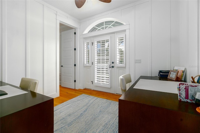 1212 S Riverside Dr, New Smyrna Beach, FL 32168 - office with light wood-style floors and a ceiling fan