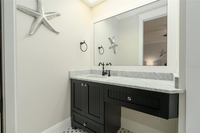 1212 S Riverside Dr, New Smyrna Beach, FL 32168 - bathroom with vanity and baseboards