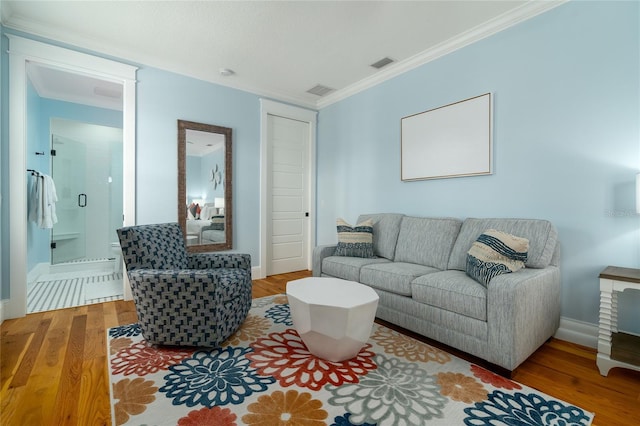 1212 S Riverside Dr, New Smyrna Beach, FL 32168 - living area with wood finished floors and crown molding