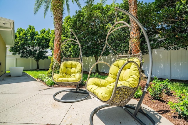 1212 S Riverside Dr, New Smyrna Beach, FL 32168 - fenced backyard featuring a patio