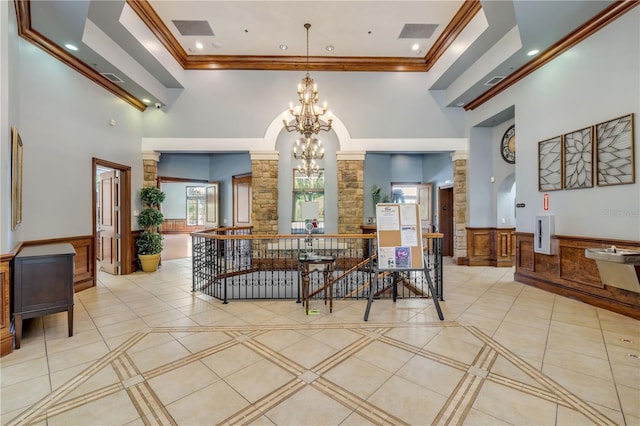 5849 Ansley Way, Mount Dora, FL 32757 - community lobby with a high ceiling, ornamental molding, recessed lighting, and a wainscoted wall
