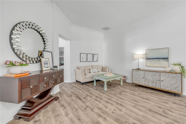 5849 Ansley Way, Mount Dora, FL 32757 - living room featuring crown molding and wood finished floors