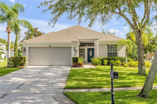 5849 Ansley Way, Mount Dora, FL 32757 - ranch-style house featuring stucco siding, an attached garage, a front lawn, concrete driveway, and a shingled roof