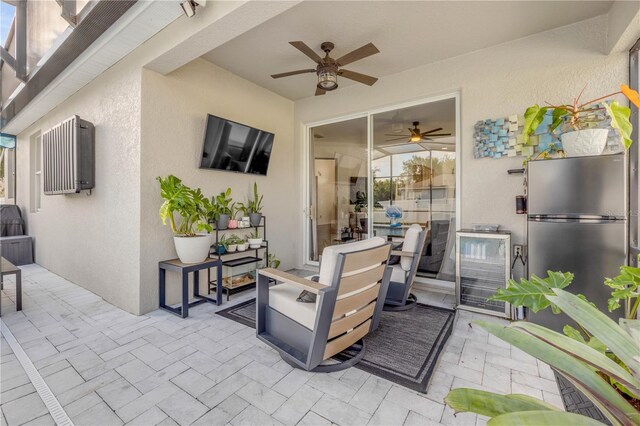 5849 Ansley Way, Mount Dora, FL 32757 - view of patio featuring wine cooler and ceiling fan