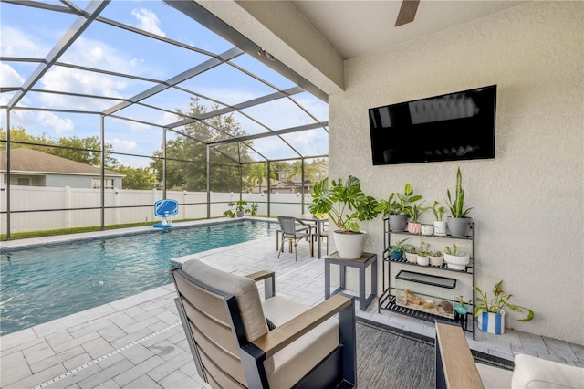 5849 Ansley Way, Mount Dora, FL 32757 - view of swimming pool featuring a patio, a ceiling fan, outdoor lounge area, and glass enclosure
