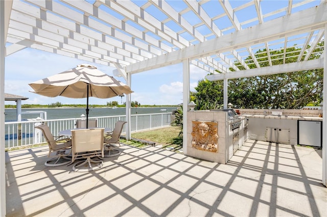 1219 Commodore Dr, New Smyrna Beach, FL 32168 - view of patio / terrace featuring a water view, area for grilling, a pergola, and outdoor dining space