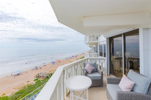 1051 Ocean Shore Blvd Unit 502, Ormond Beach, FL 32176 - balcony featuring view of water and beach